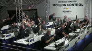 Mission Control erupts with applause and cheers after Felix touches down.