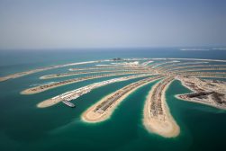 Palm Jumeirah is an artificial island in the shape of palm that is the backdrop for World Skydiving Championship - Dubai Mondial